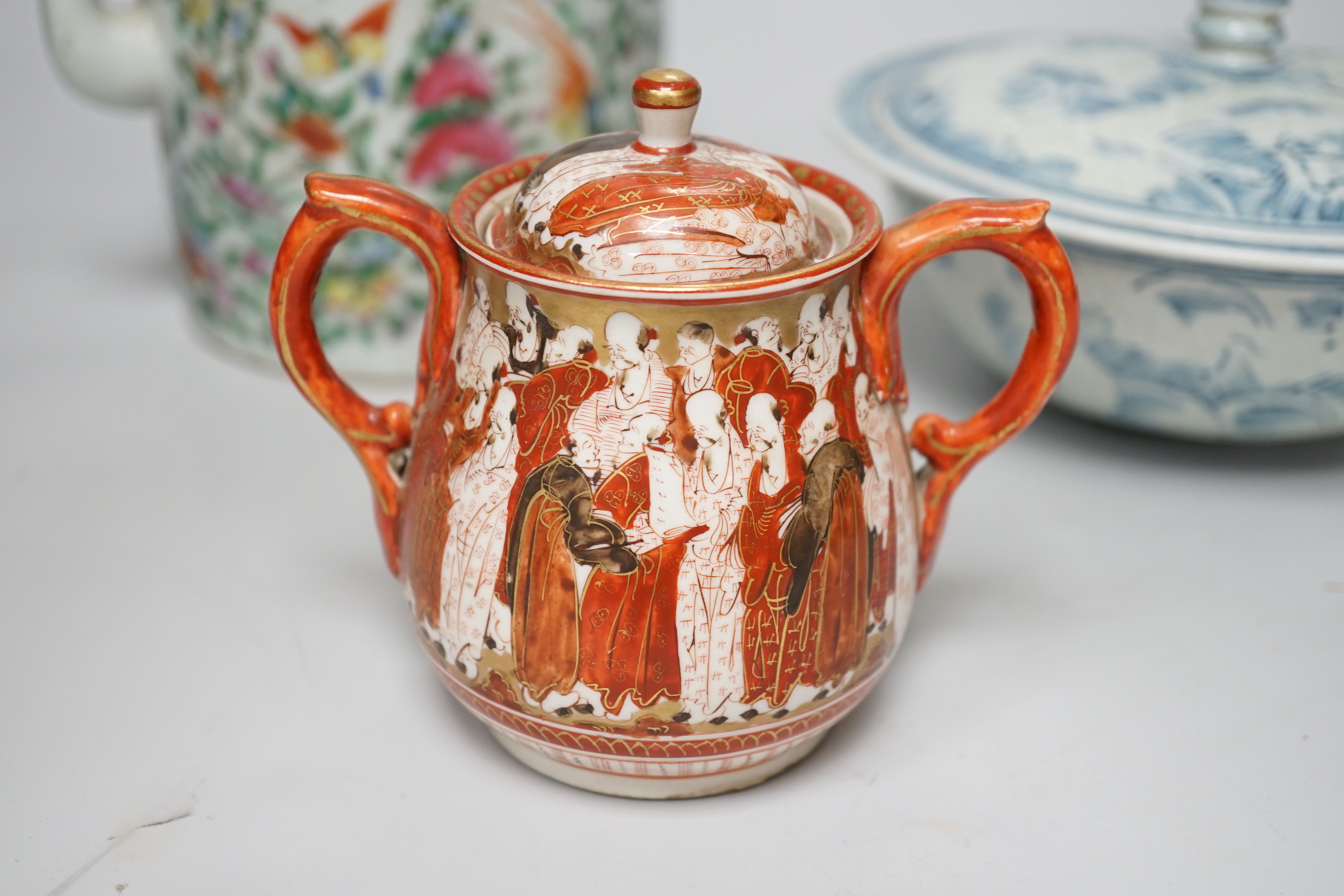Assorted Chinese and Japanese ceramics including a Kutani jar and cover and a floral teapot, the largest 15cm high